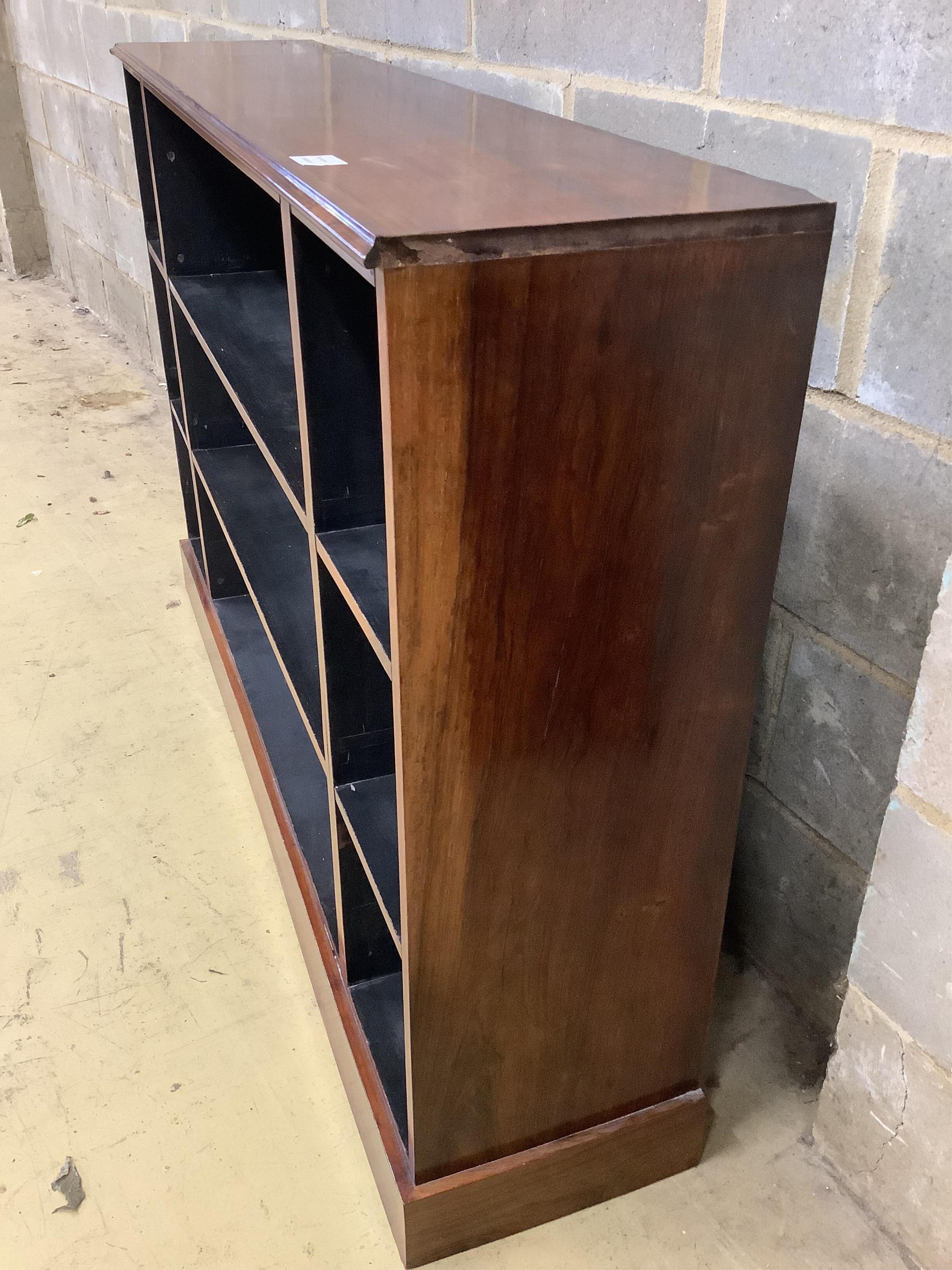 A 19th century and later rosewood open low bookcase, width 138cm, depth 30cm, height 91cm. Condition - fair